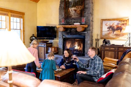 Family spending time together in a rental at the Aspens in Jackson Hole